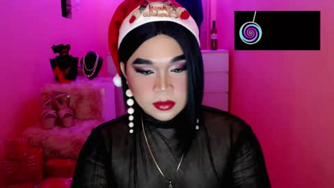 Snapshot of amiadoll chatting on 12.24.24 Queen Mireska online show from 12.24.24